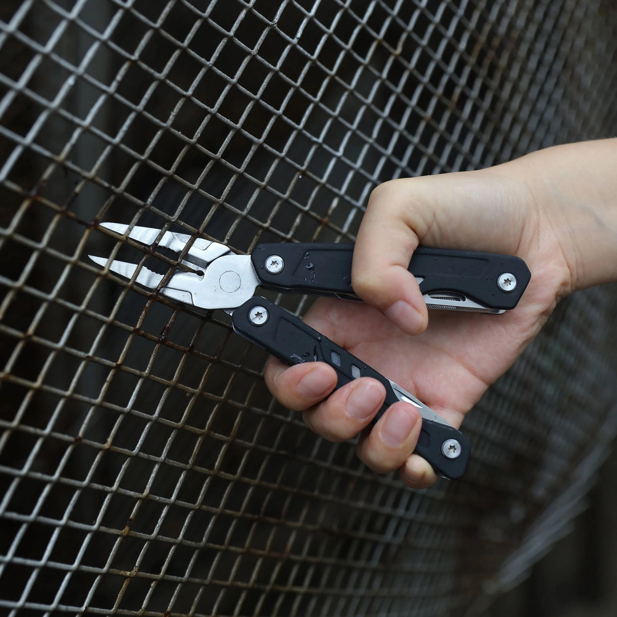 Ozark Trail 17-in-1 Multi tool, Stainless Steel, Black, Model 2119