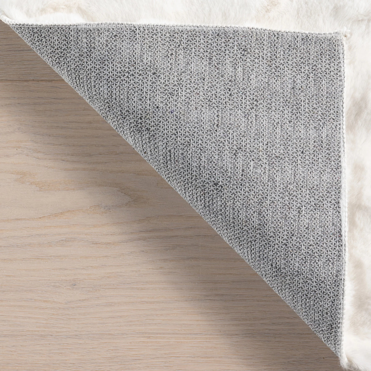 nuLOOM Jeni SuperiorWash Solid Faux Rabbit Machine Washable Area Rug, 2' 6" x 8', Runner, Jeni Grey